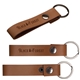 a tan leather snap keytag