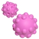 aerial view a pink push pop bounce ball, image 1 of 2
