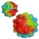 aerial view a reactive rainbow push pop bounce ball, image 1 of 2