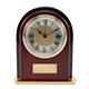 aerial view a rosewood/black rosewood and black glass arch clock, image 1 of 3