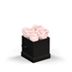 aerial view a black box & blush rose classique by vef le petit, image 1 of 2