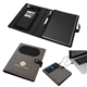 a group of navigate notebook w / wireless phone charger