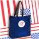 aerial view a group of laminated non woven polypropylene tote 13 w x 13 h x 5 d, image 1 of 2