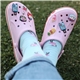 aerial view a various 2d custom - molded clog shoe charms, image 1 of 2