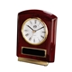 a rosewood polished rosewood cornell desk clock
