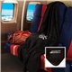 aerial view a black micro - plush fleece blanket, image 1 of 2