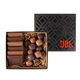 a black 6 piece cookie and confection gift box with sea salt caramels