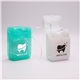 a group of pocket - sized mini dental floss