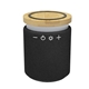 aerial view a black ultra - sound speaker with 10w bamboo wireless charger, image 1 of 2