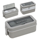 aerial view a gray connoisseur 3- compartment stackable lunch box with utensils, image 1 of 2