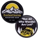 a black challenge coin - black - 1.75 round