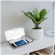 a group of chi - charge uv - c phone sanitizer box with wireless charging