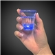 a group of light up blue shot glass