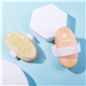 a group of seascape shower brush