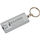 a silver flat rectangle key tag light