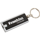 a black flat rectangle key tag light