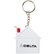 a white house keychain tape measure with release button