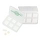 a translucent white 6 compartment pill box