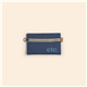 aerial view a group of front zipper pouch small - colored canvas with leather tab, image 3 of 4
