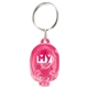 a trans pink light up piggy keytag