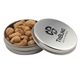 a silver round tin with cashews