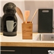 a group of bamboo - box utensil holder