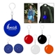 a group of poncho ball key chain