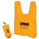 aerial view a orange folding tote in a pouch, image 1 of 2