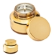 aerial view a metallic gold mini glass candle, image 1 of 2