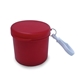 aerial view a translucent red disposable poncho in case with clip, image 1 of 5