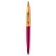 a burgundy barrel & creamsicle cap gold trim pens