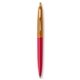 a red barrel & metallic orange cap gold trim pens