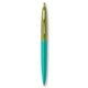 a teal barrel & metallic green cap gold trim pens