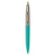a teal barrel & metallic silver cap gold trim pens