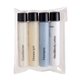 aerial view a clear 4- piece travel amenities kit, image 1 of 4