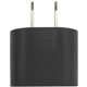 aerial view a black oval ac charger wall adapter, image 1 of 2