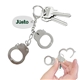 a silver metal plastic mini handcuff key chain