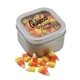 a silver window tin with candy corn