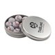 a silver round tin with chocolate baseballs
