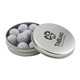 a silver round tin with chocolate golf balls