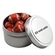 a silver round tin with chocolate footballs