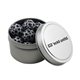 a silver round tin with chocolate soccer balls