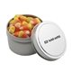 a silver round tin with candy corn