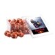 a clear acrylic box with chocolate footballs