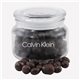 a clear glass jar jar with choc espresso beans