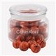 a clear glass jar jar with chocolate basketballs
