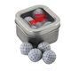 a silver window tin with chocolate golf balls