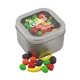 a silver window tin with candy fruits