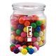 a clear glass jar round glass jar. with gumballs