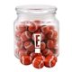 a clear glass jar jar with chocolate footballs
